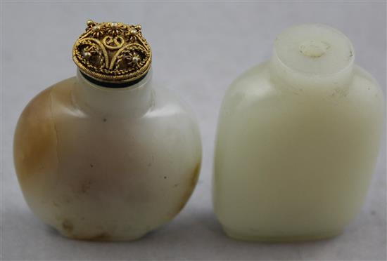 Two Chinese pale celadon jade snuff bottles, 1800-1900, Richards no.s 34 and 359